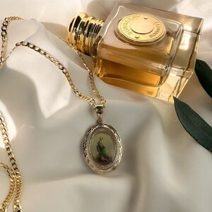 Gold Religious Oval Locket Necklace